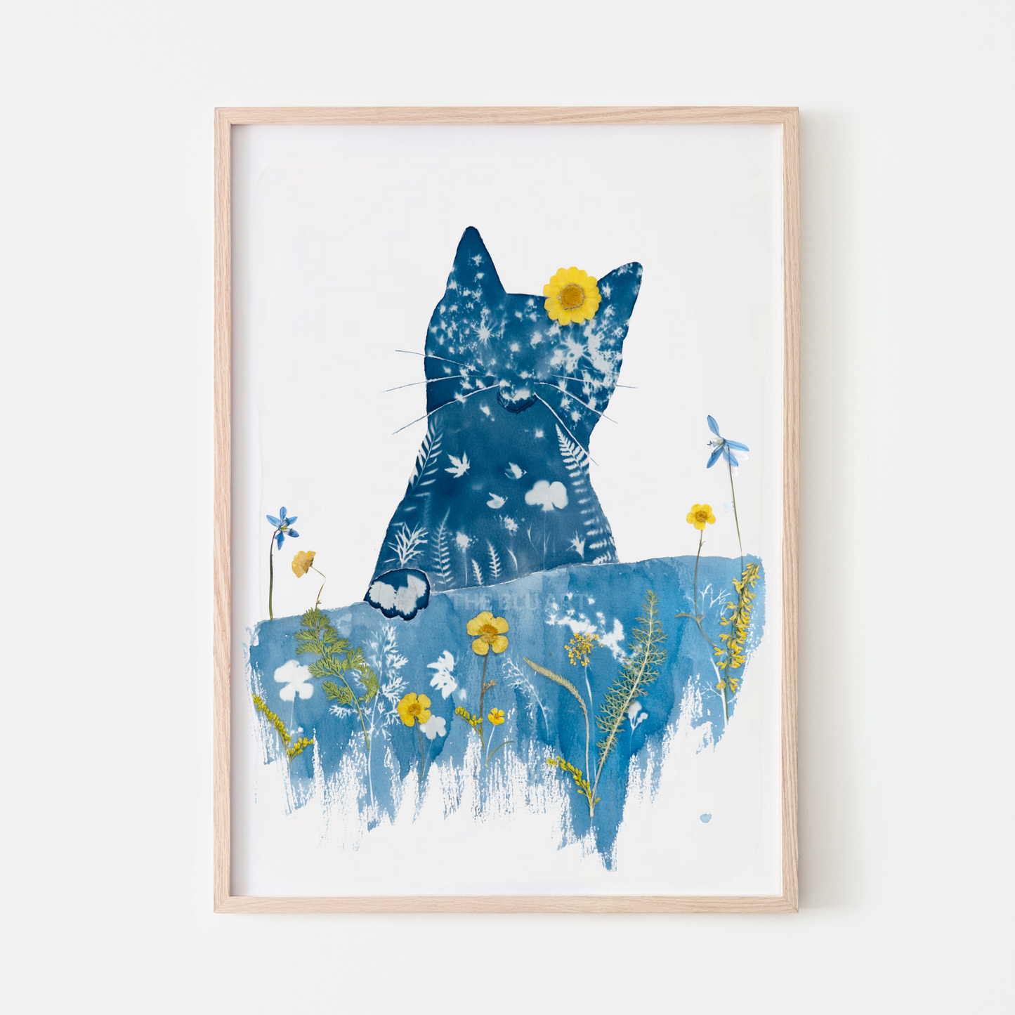 cyanotype print flower art blue cat sitting at the dining table 
